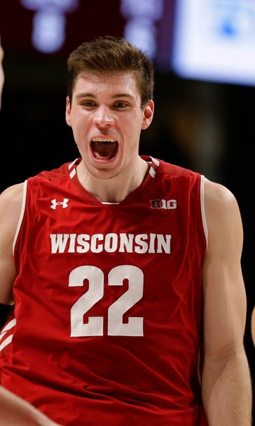 Unflappable Happ helps 19th-ranked Badgers keep rolling